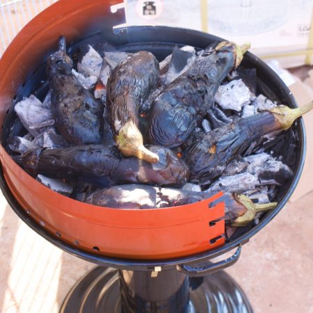 Burning of aubergines in a brazier