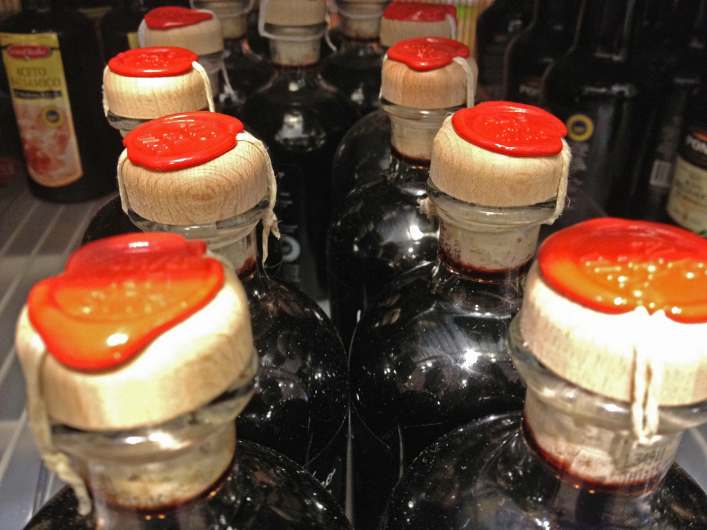 The top of eight bottles of balsamic